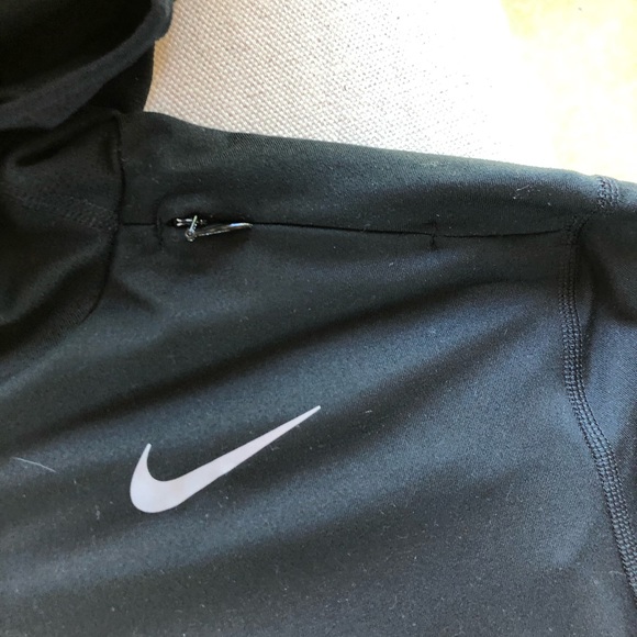 A Nike pull over with hood zippers and thumb holes - Picture 6 of 6